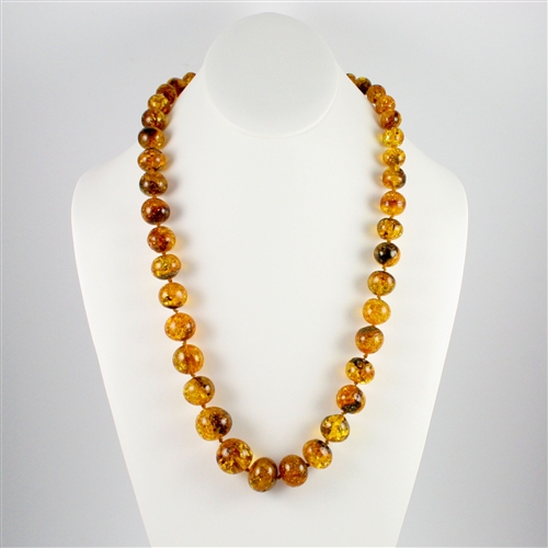 amber necklace the beads on this beautiful necklace are circular shaped and are graduated  in size HVURCIS