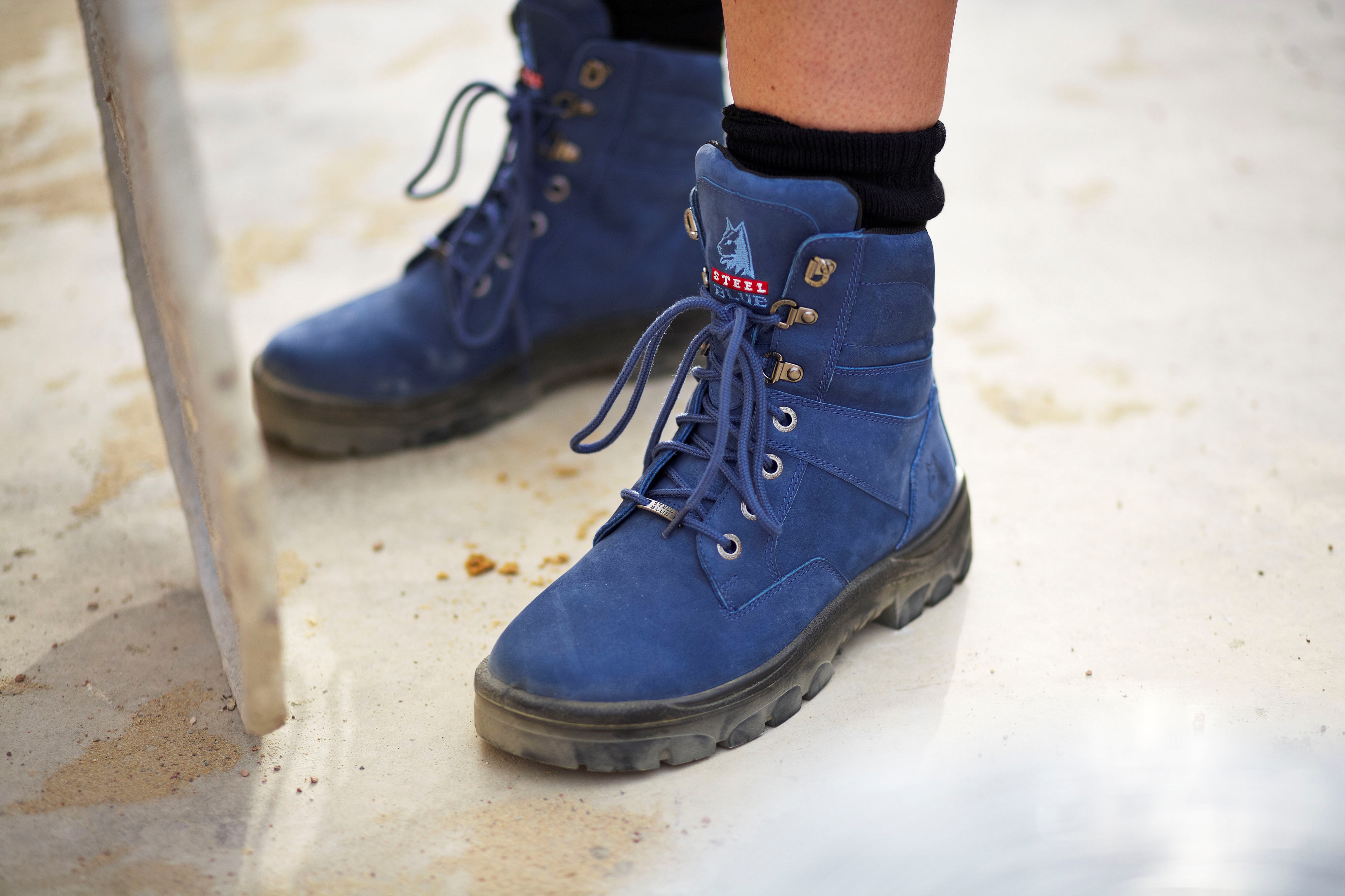 blue boots are available in safety and non safety options. hlssahj