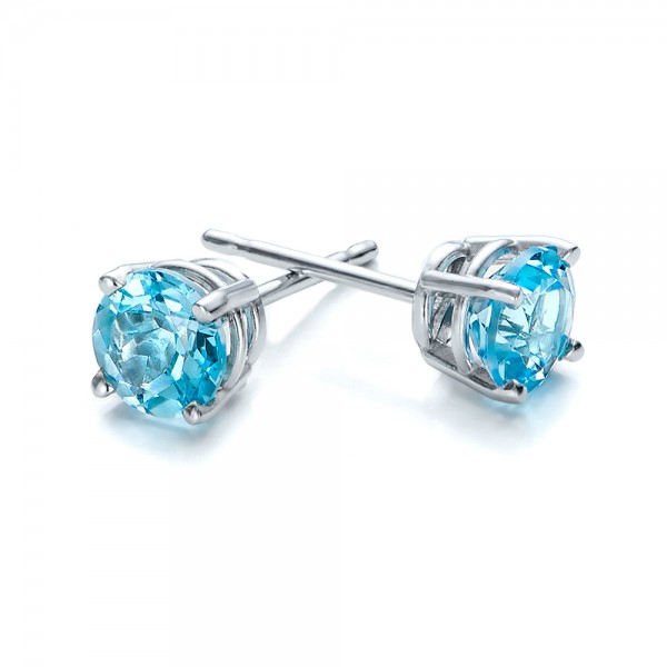blue topaz earrings ... blue topaz stud earrings - laying view ... AQMBYNC