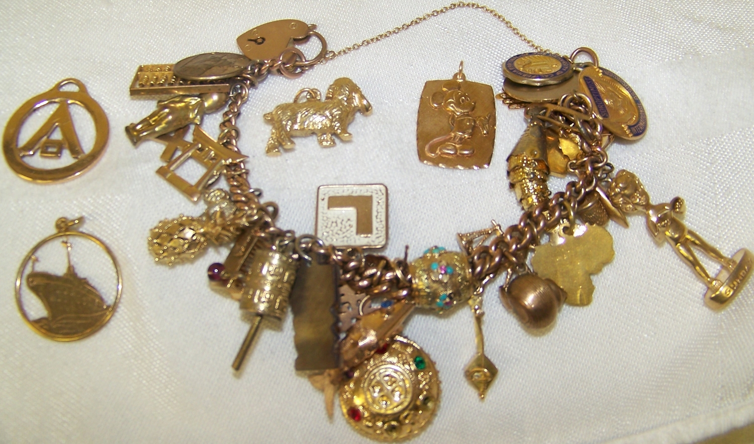 gold charms for bracelets a 9k yellow gold charm bracelet w/ 14k yellow gold (18.2 g)charms. loading  zoom nsamhwk