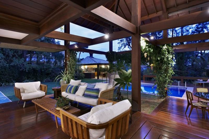 lounge of House with Wooden Elements and Beautiful Garden - The .