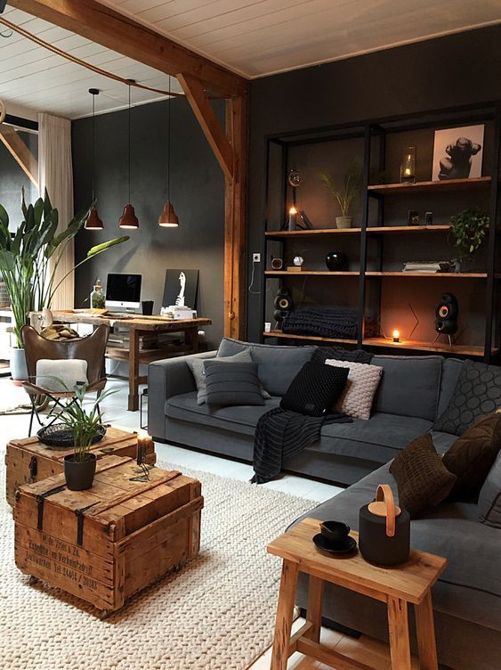 Masculine Industrial Living Room With A Wall-Mounted Shelving Unit .