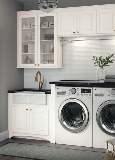 An on trend laundry room Cardell® Cornerstone Collection White .
